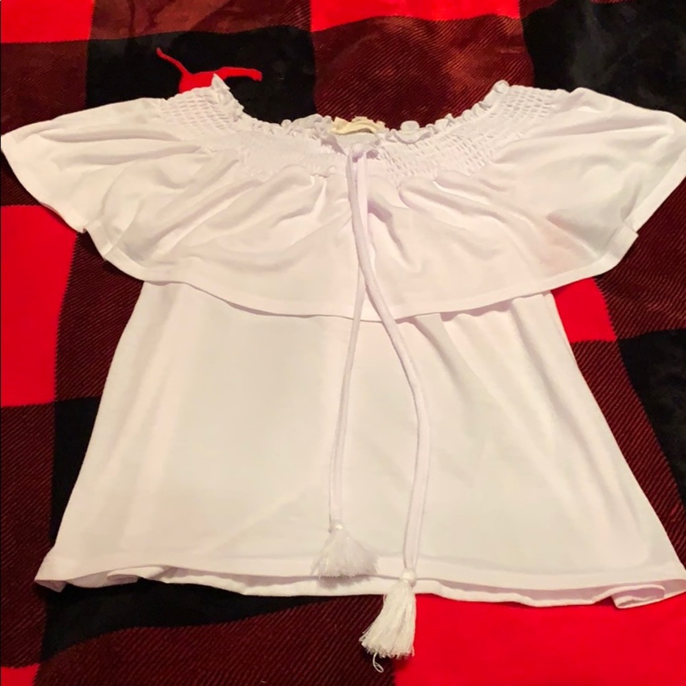 White Shoulder less blouse worn ones